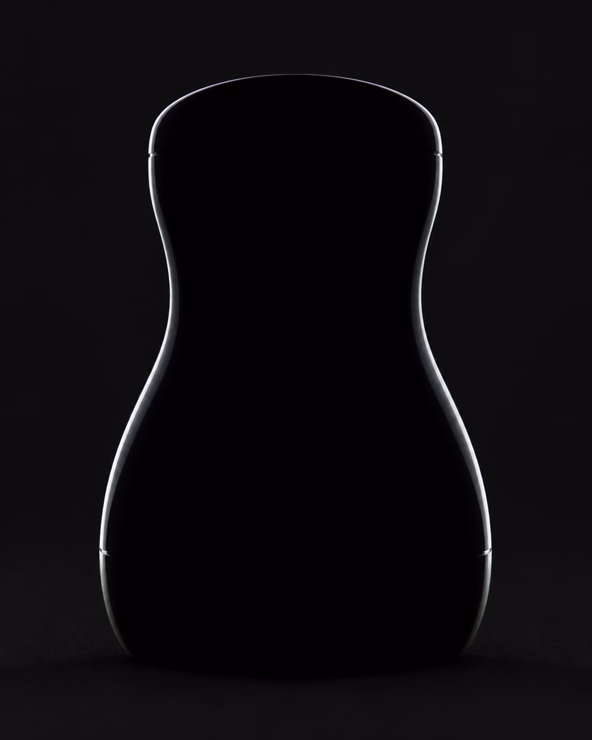 Undisclosed product silhouette edged by a thin steel rim light