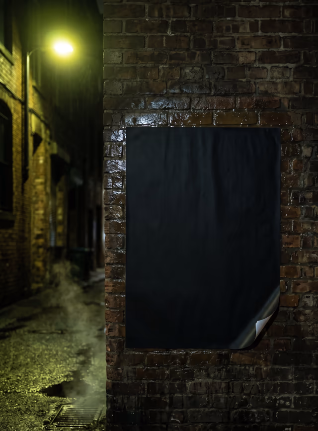 A brick alley at night holds a blank black poster under an acid-green streetlamp.